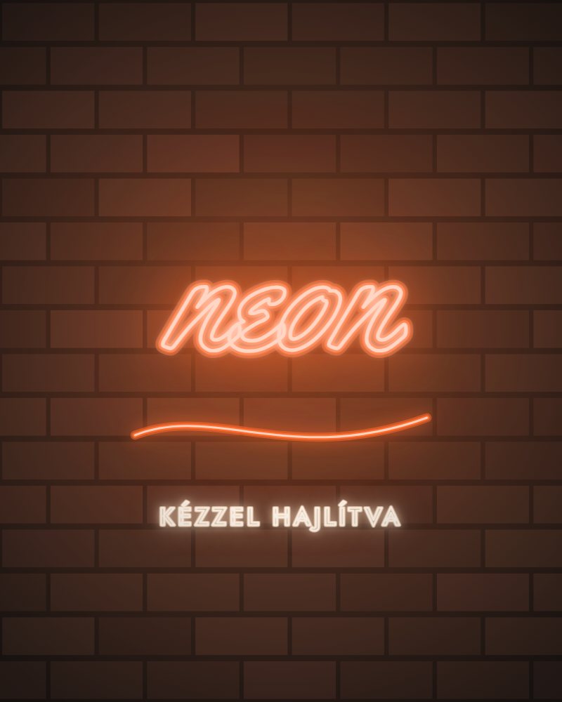 Kézzel hajlított narancssárga neoncső felirat téglafalon (illusztráció)